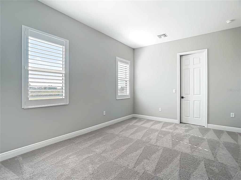 3586 Recurve Circle Sarasota, FL 34240 - Photo 45 of 66 a view of an empty room with a window
