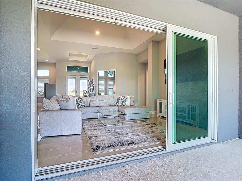 3586 Recurve Circle Sarasota, FL 34240 - Photo 51 of 66 a living room with furniture and a rug