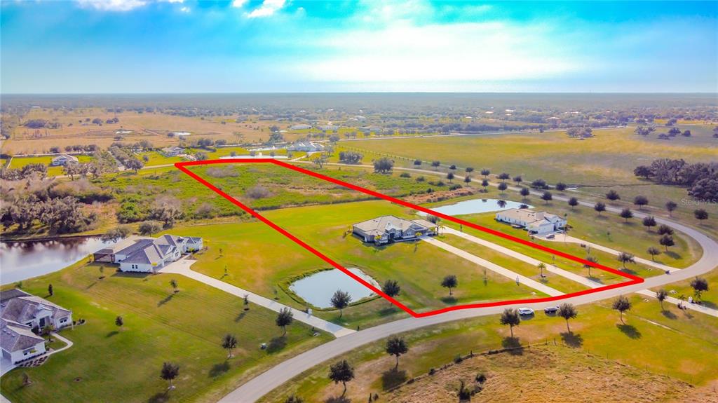 3586 Recurve Circle Sarasota, FL 34240 - Photo 54 of 66 an aerial view of a city