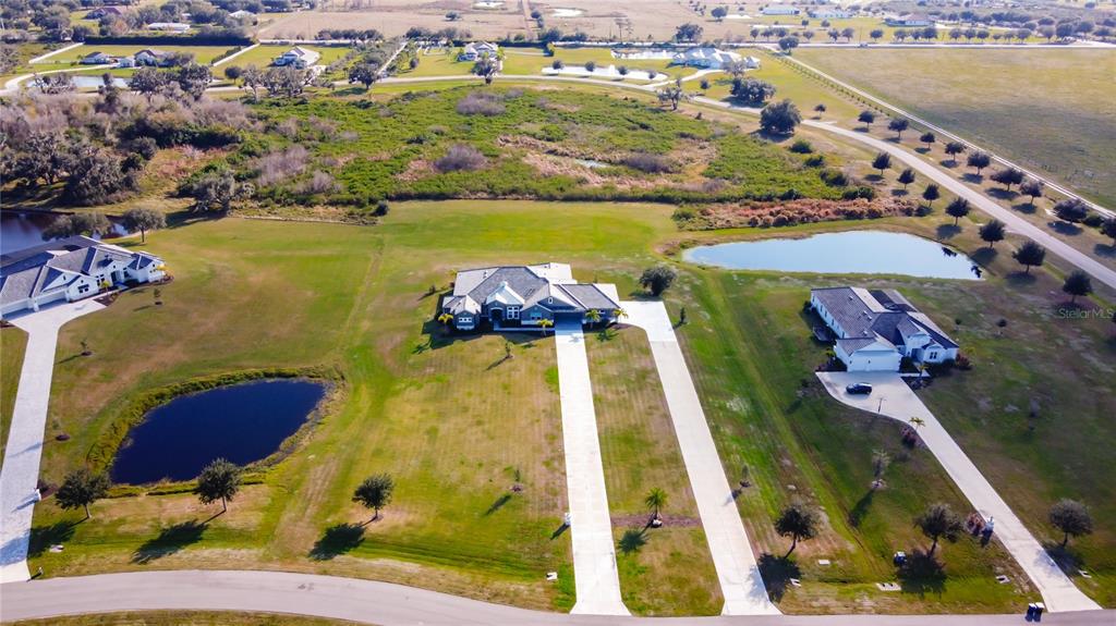 3586 Recurve Circle Sarasota, FL 34240 - Photo 55 of 65 an aerial view of residential houses with outdoor space