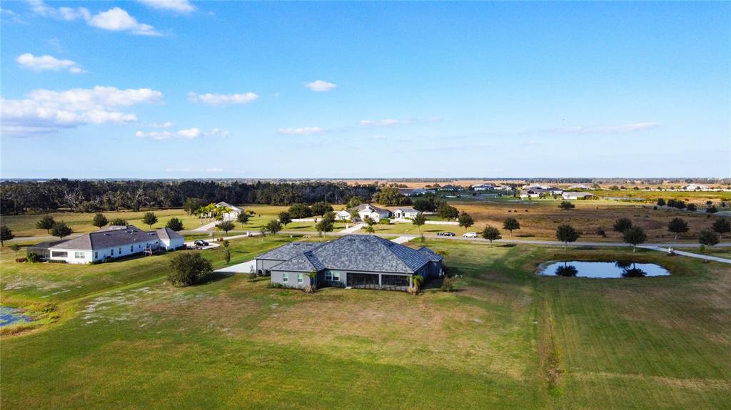 3586 Recurve Circle Sarasota, FL 34240 - Photo 62 of 66 a view of a lake with a car parked