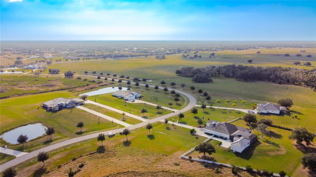 3586 Recurve Circle Sarasota, FL 34240 - Photo 65 of 66 an aerial view of a city with lawn chairs