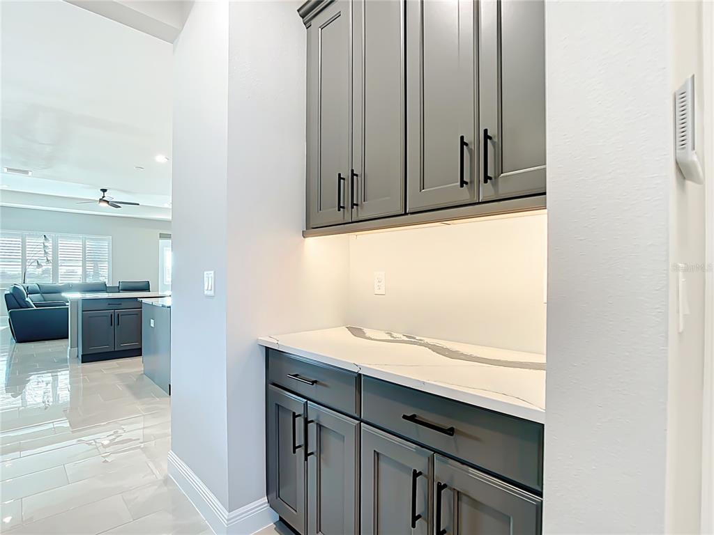 3586 Recurve Circle Sarasota, FL 34240 - Photo 10 of 65 a bathroom with a sink and a mirror