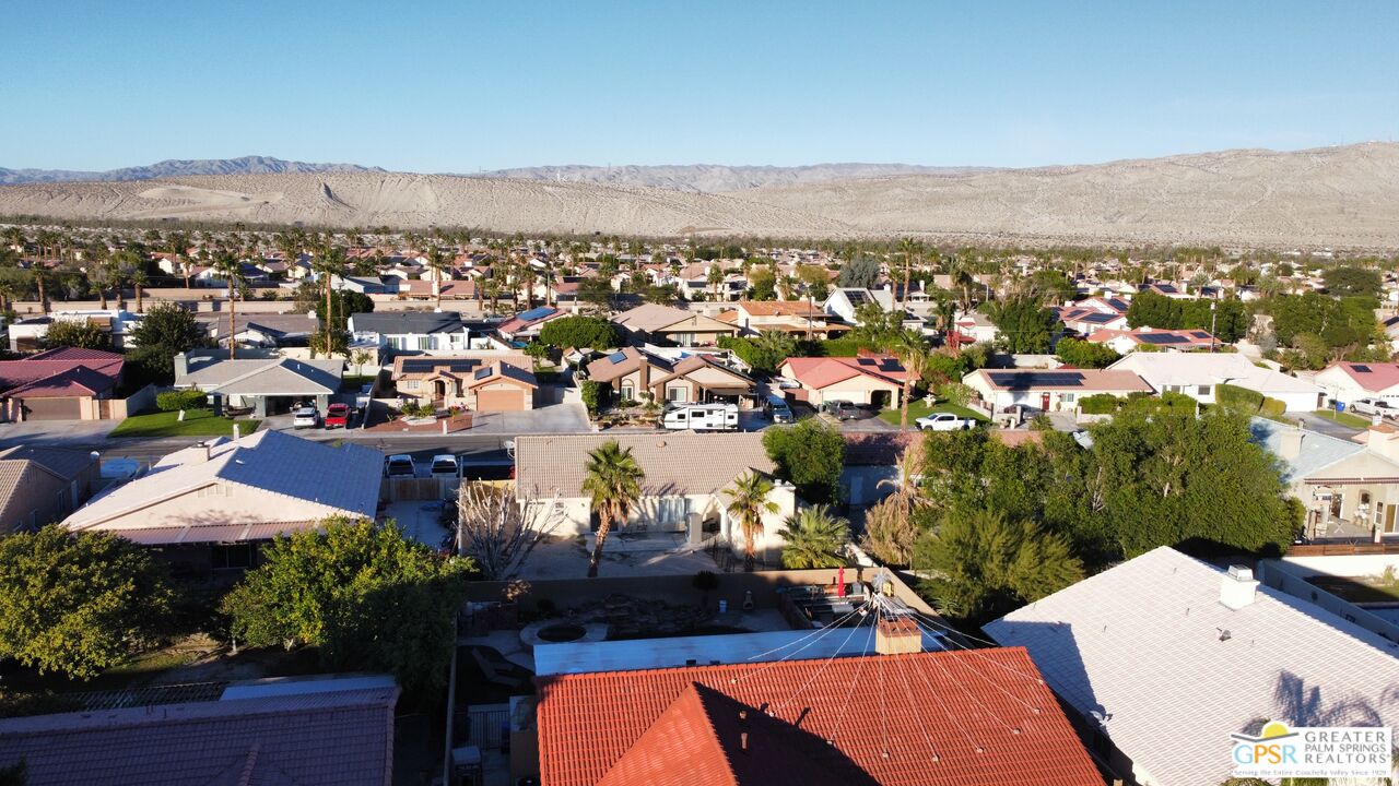 68120 Empalmo Road Cathedral City, CA 92234 - Photo 4 of 10 an aerial view of residential houses and outdoor space
