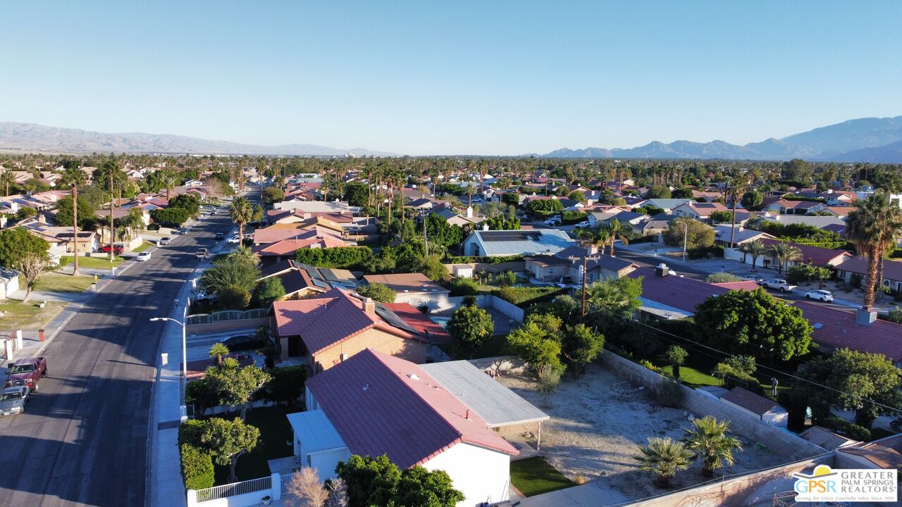 68120 Empalmo Road Cathedral City, CA 92234 - Photo 6 of 10 an aerial view of residential houses with outdoor space and trees