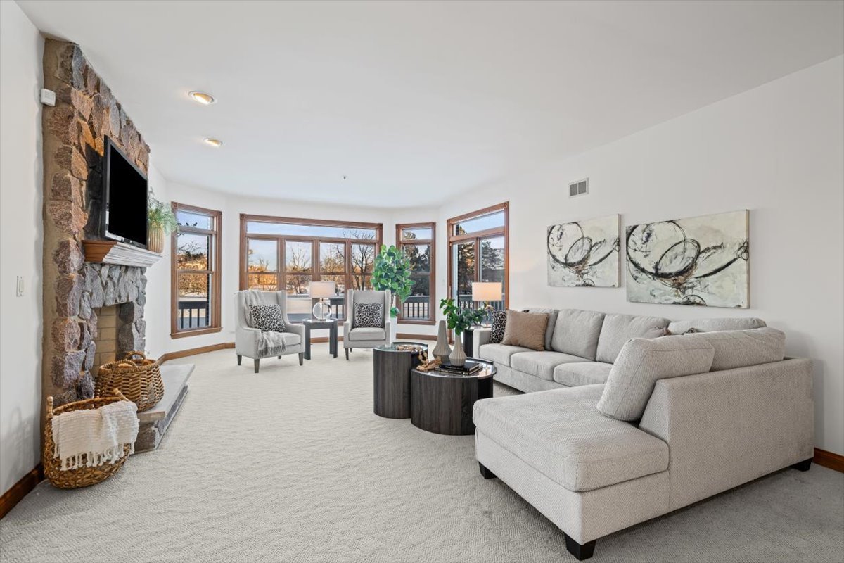 4588 Pamela Court Long Grove, IL 60047 - Photo 23 of 59 a living room with furniture and a flat screen tv