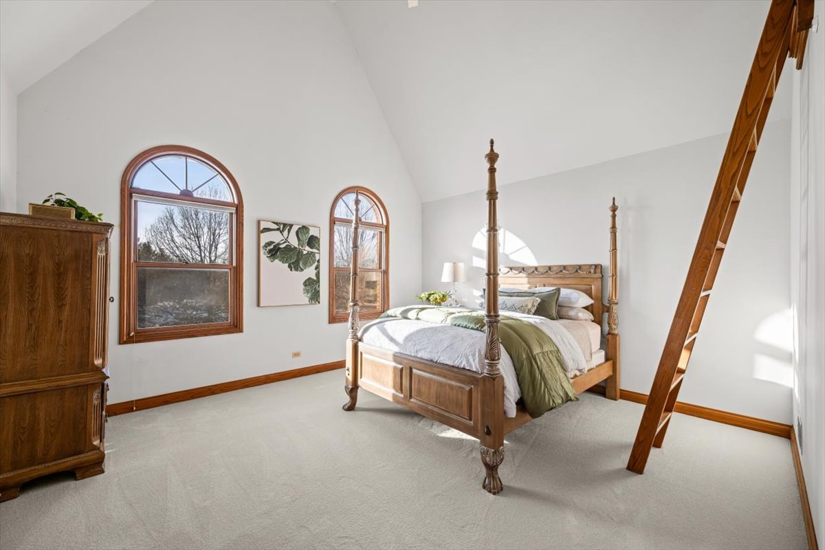 4588 Pamela Court Long Grove, IL 60047 - Photo 39 of 59 a bed room with furniture and a window