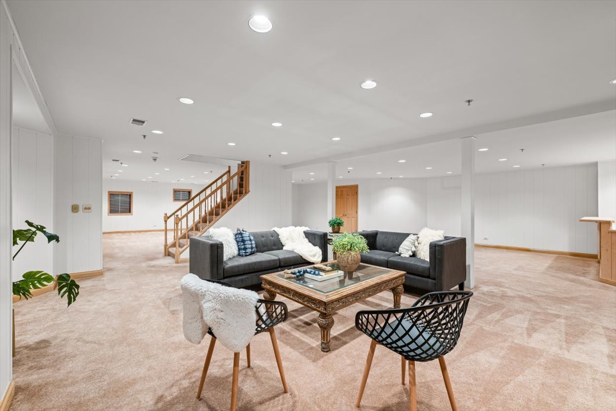 4588 Pamela Court Long Grove, IL 60047 - Photo 45 of 59 a living room with furniture and wooden floor