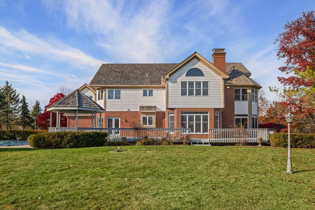 4588 Pamela Court Long Grove, IL 60047 - Photo 5 of 59 a front view of a house with a yard