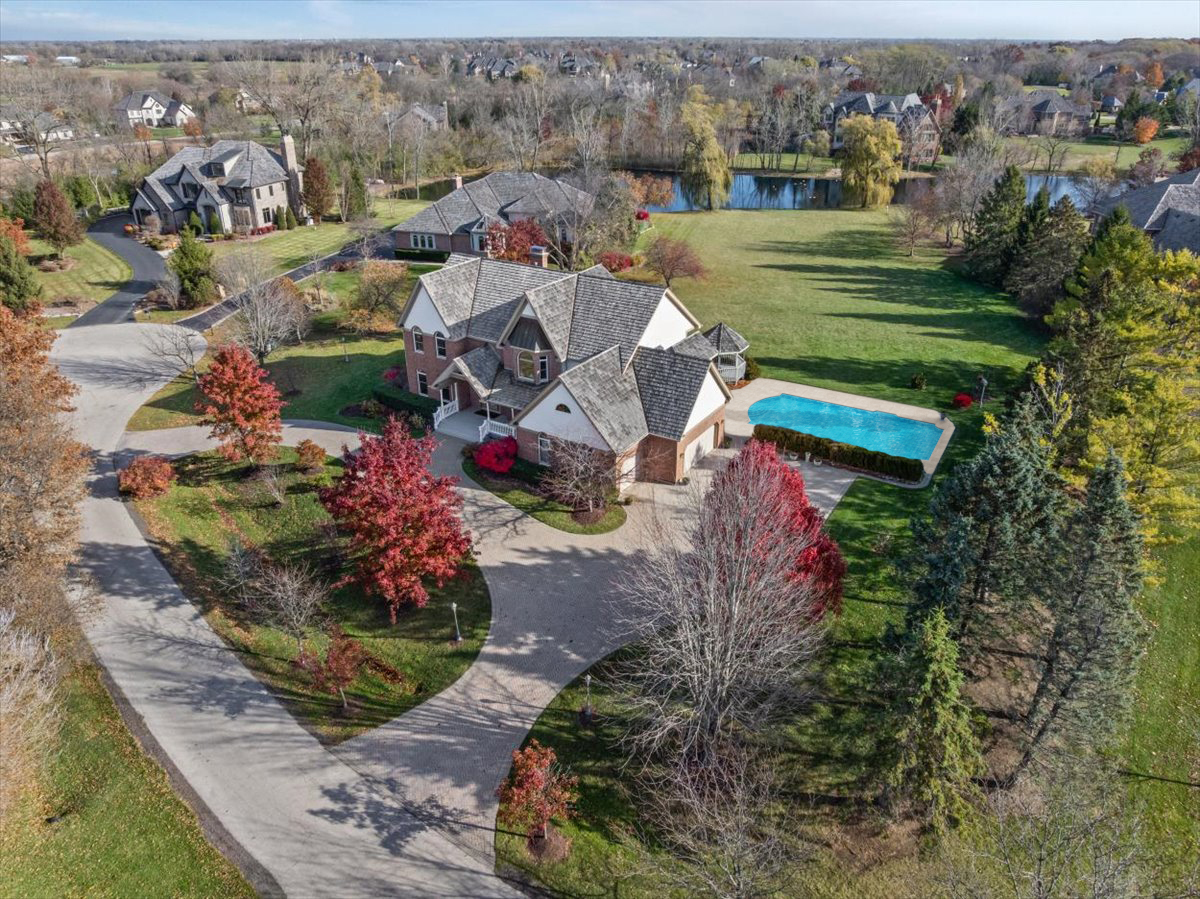 4588 Pamela Court Long Grove, IL 60047 - Photo 7 of 59 a view of a houses with outdoor space