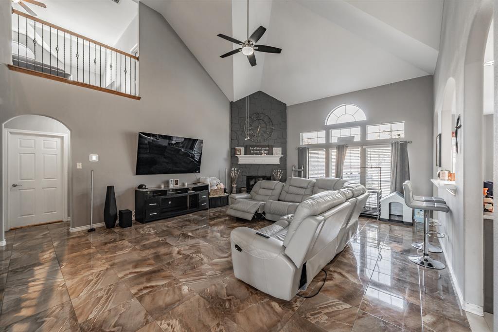 5243 West Cove Way Grand Prairie, TX 75052 - Photo 10 of 38 a living room with fireplace furniture and a flat screen tv