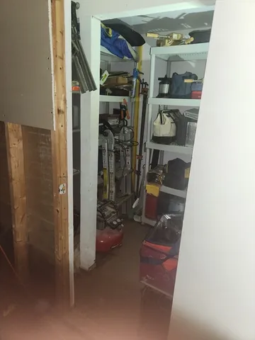 a front view of a house with a yard and outdoor seating