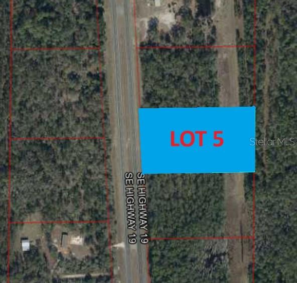 19 St Inglis Inglis, FL 34449 - Photo 2 of 9 a sign that is on the side of a road