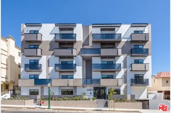 a front view of a building with street
