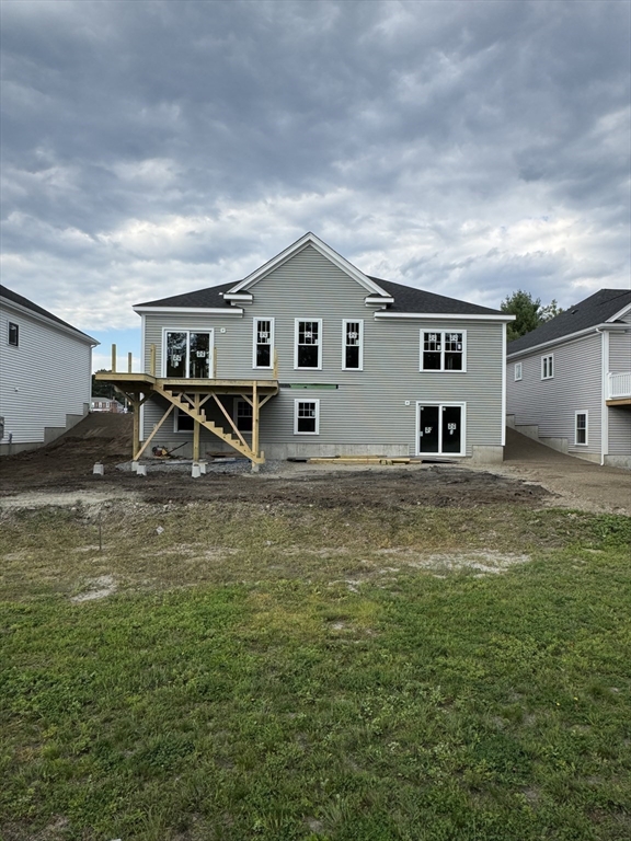 3 Coach Road Easton, MA 02375 - Photo 6 of 8 a view of a house with a yard