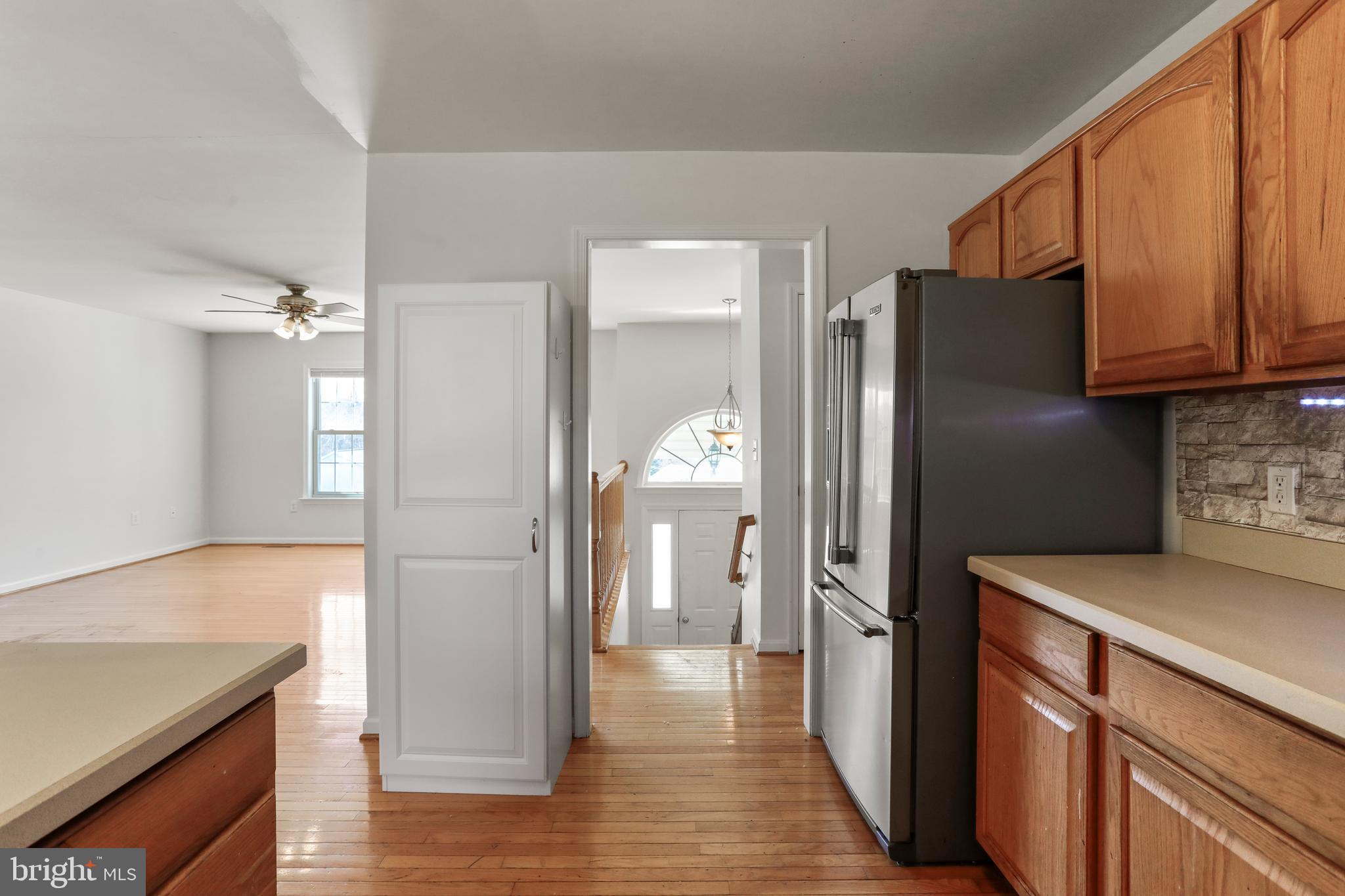 994 View Crest Court Front Royal, VA 22630 - Photo 11 of 33 a kitchen with a refrigerator and a sink