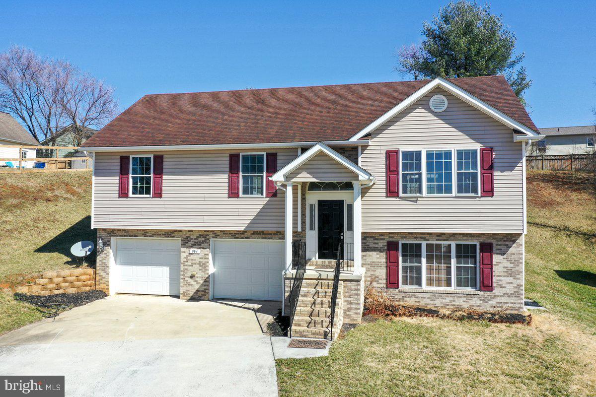994 View Crest Court Front Royal, VA 22630 - Photo 2 of 33 a front view of a house with a yard