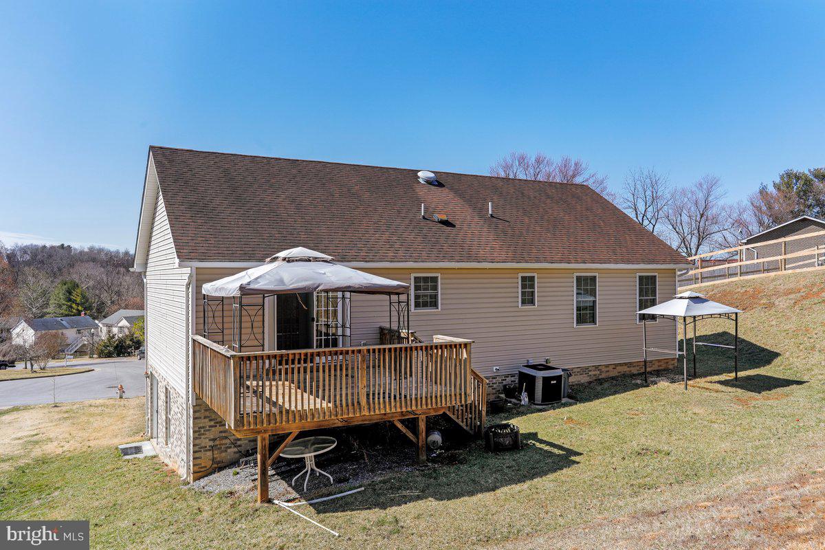 994 View Crest Court Front Royal, VA 22630 - Photo 3 of 33 an aerial view of a house with a yard and sitting area
