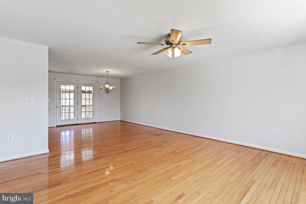 994 View Crest Court Front Royal, VA 22630 - Photo 10 of 33 a view of empty room with wooden floor and fan