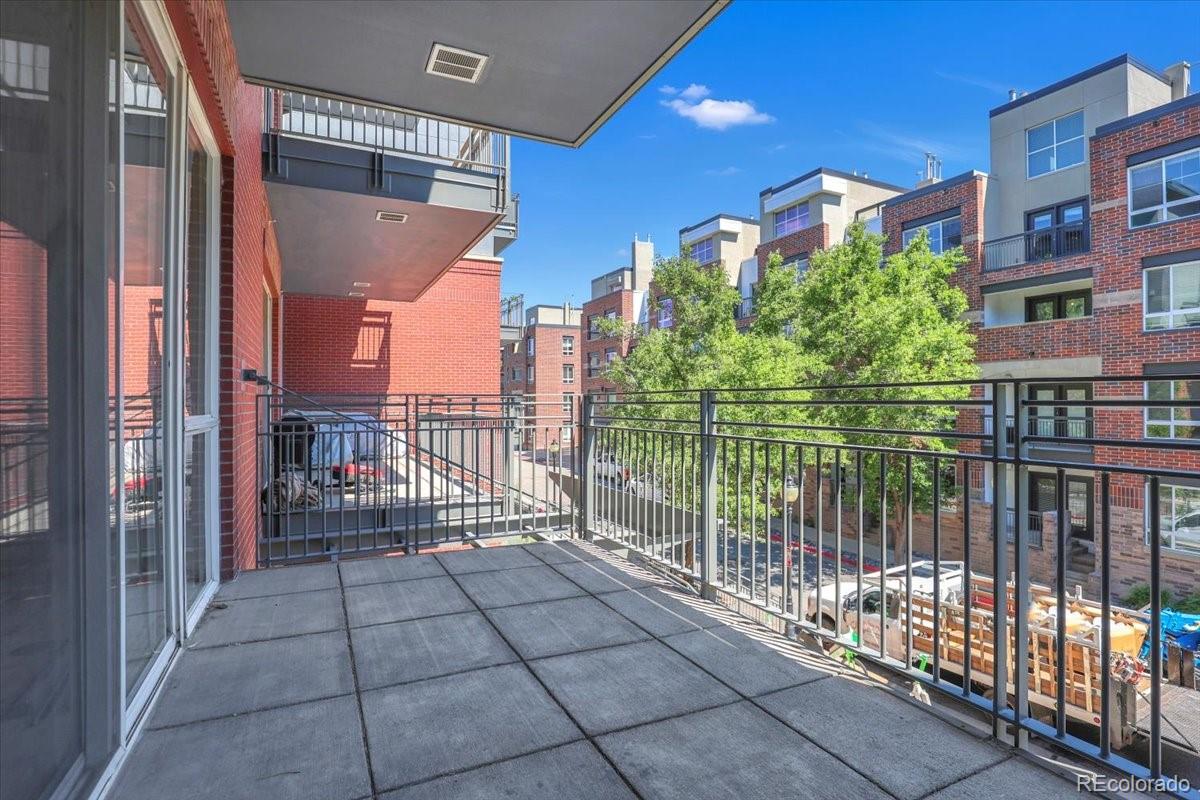 1438 Little Raven Street, Unit 201 Denver, CO 80202 - Photo 12 of 27 a view of a balcony with city view
