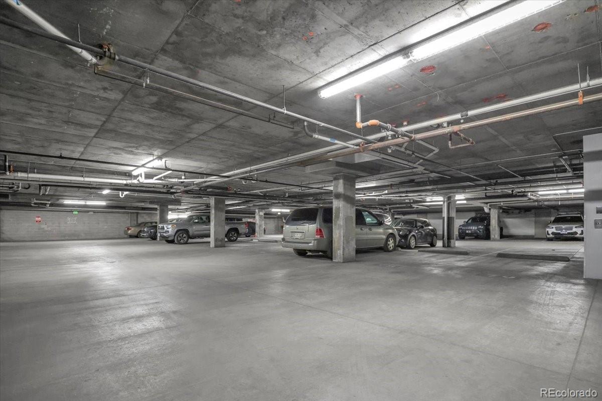 1438 Little Raven Street, Unit 201 Denver, CO 80202 - Photo 20 of 27 a view of parking area