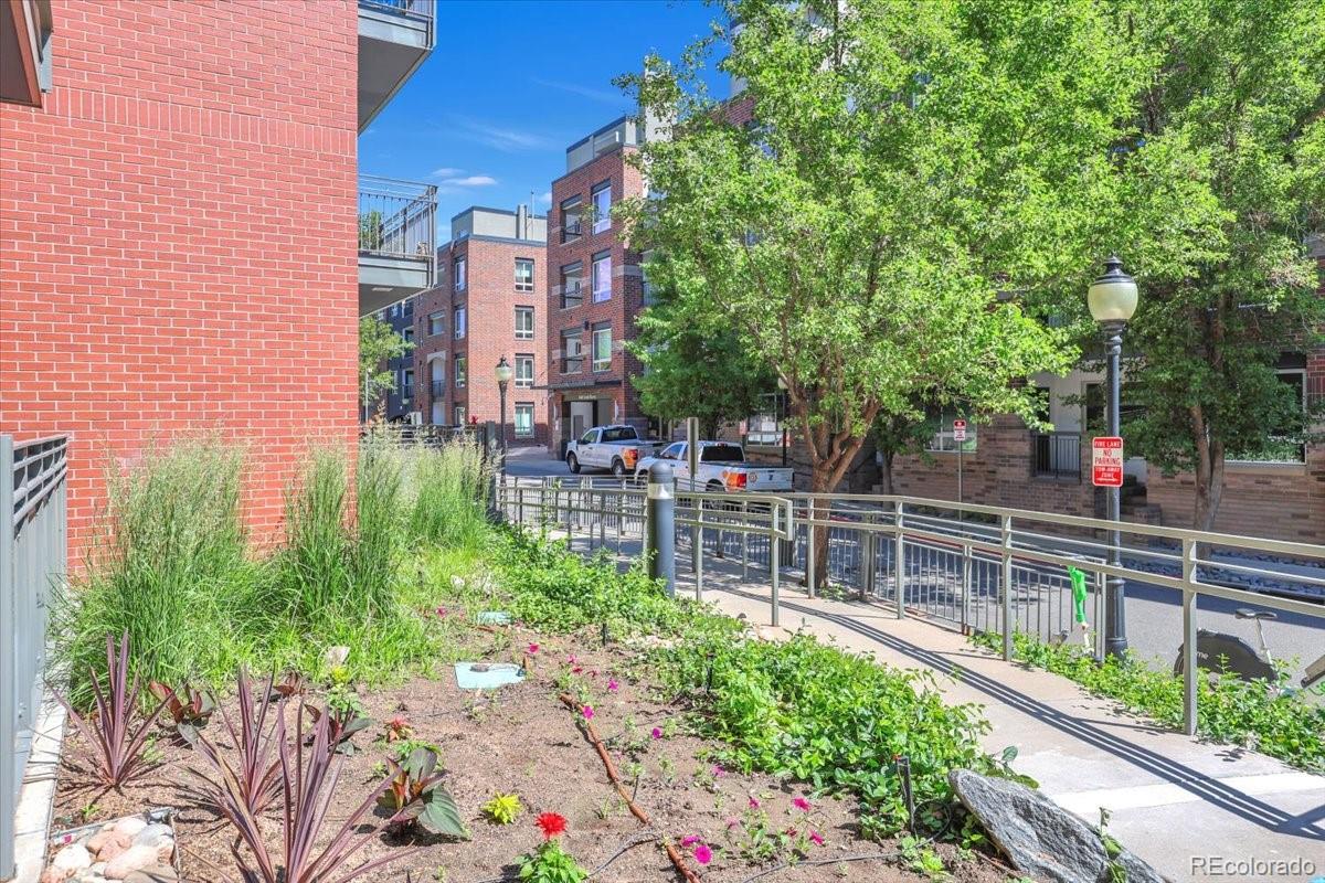 1438 Little Raven Street, Unit 201 Denver, CO 80202 - Photo 23 of 27 a view of a city with tall buildings
