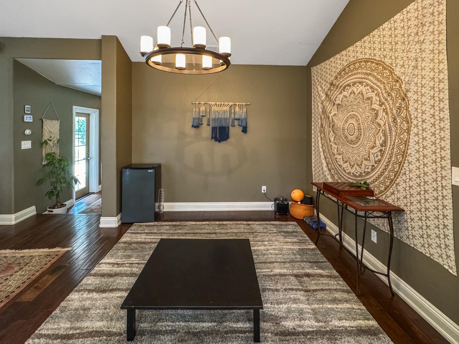 15655 Rough And Ready Highway Rough and Ready, CA 95975 - Photo 16 of 48 a bedroom with a bed and a chandelier