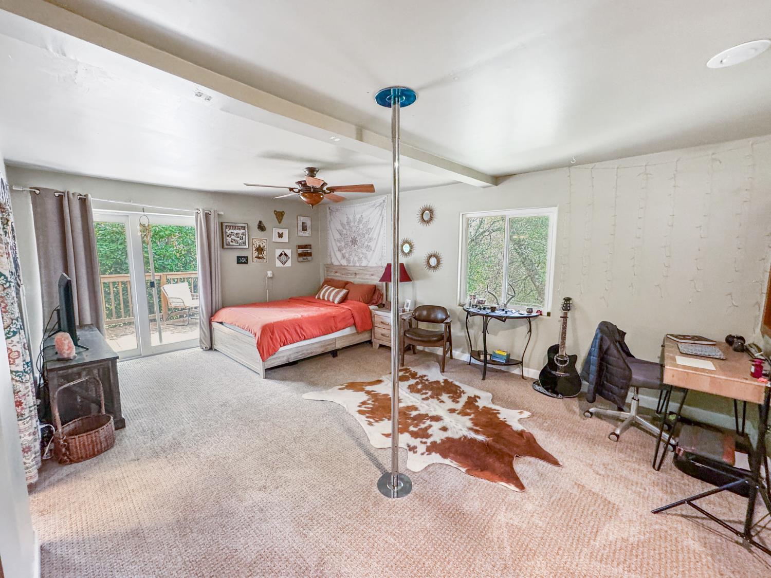 15655 Rough And Ready Highway Rough and Ready, CA 95975 - Photo 21 of 48 a bedroom with furniture and a large window