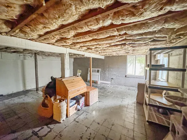 a outdoor living space with furniture and a potted plant