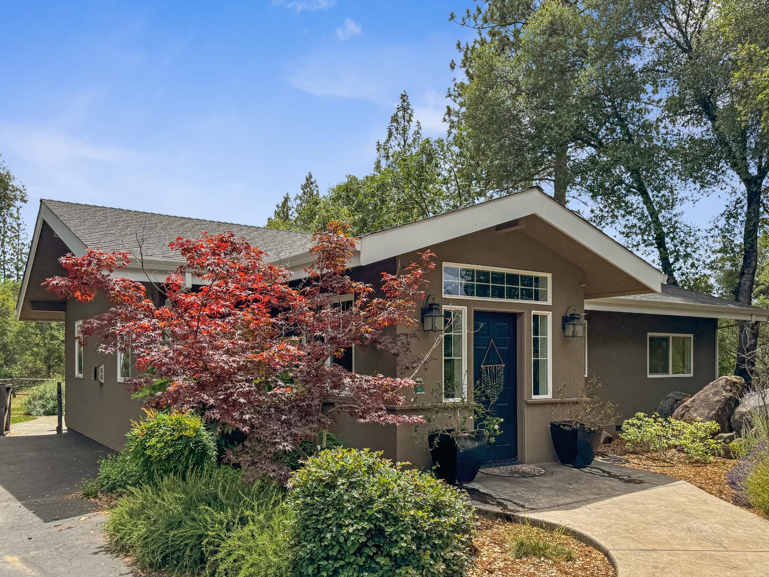 15655 Rough And Ready Highway Rough and Ready, CA 95975 - Photo 37 of 48 a front view of a house with a yard