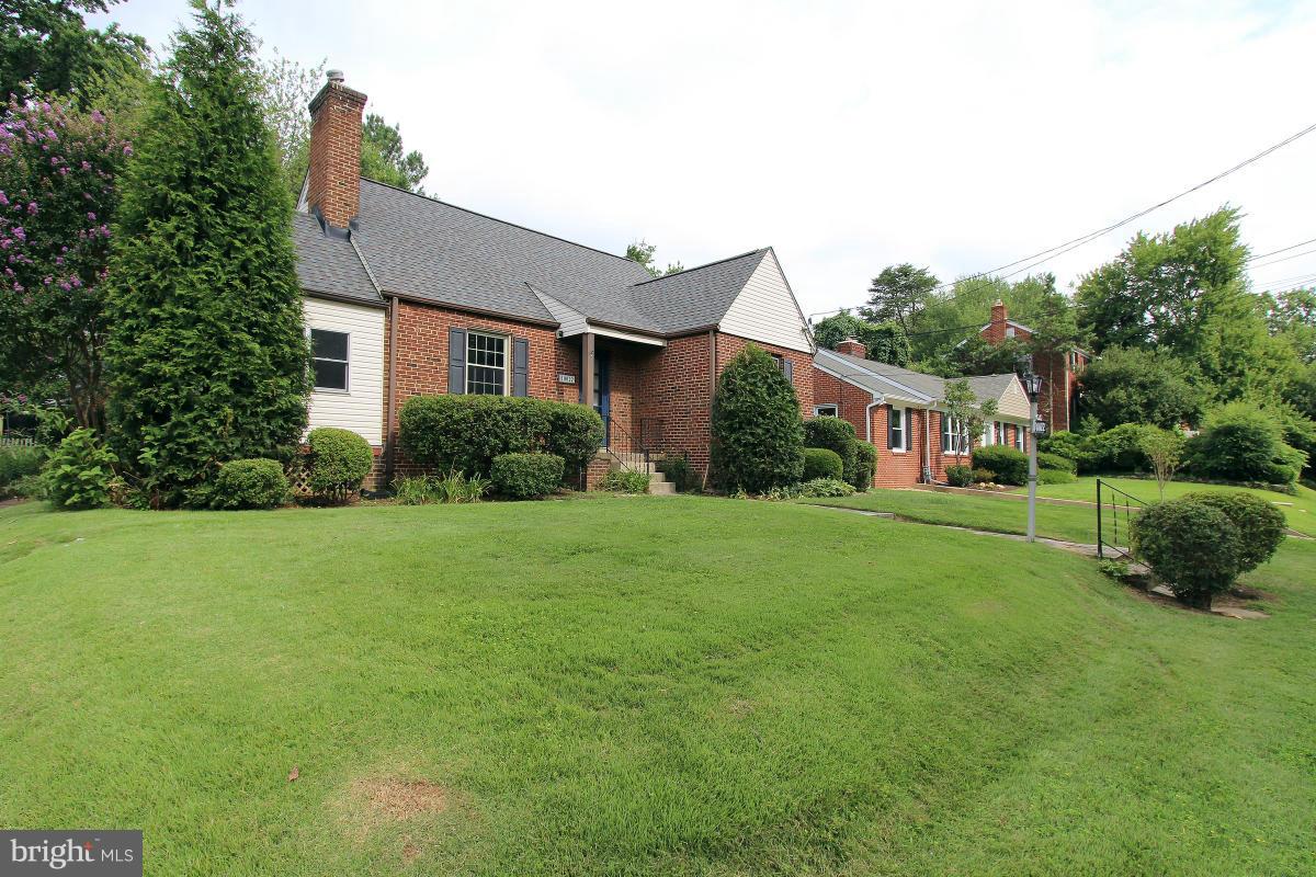 10022 Dallas Avenue Silver Spring, MD 20901 - Photo 2 of 30 a view of a house with backyard and garden