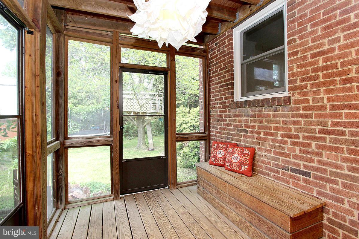 10022 Dallas Avenue Silver Spring, MD 20901 - Photo 13 of 30 a view of a brick wall with a large window