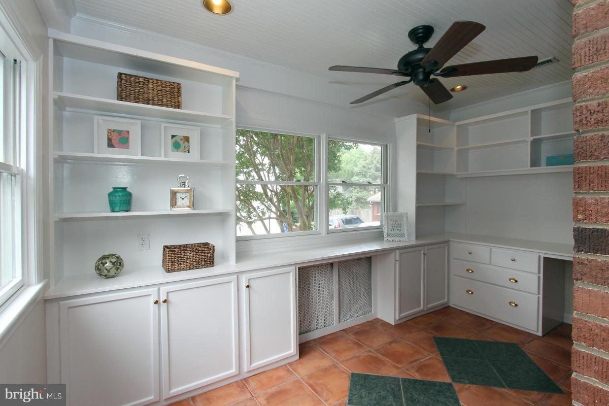 10022 Dallas Avenue Silver Spring, MD 20901 - Photo 8 of 30 a kitchen with a cabinets and window
