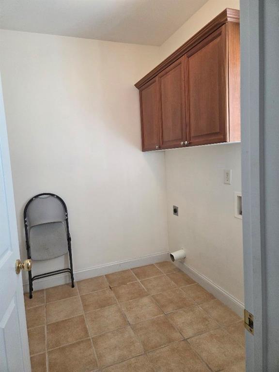 465 Young James Circle Stockbridge, GA 30281 - Photo 16 of 45 a view of a livingroom with wooden cabinets and a window