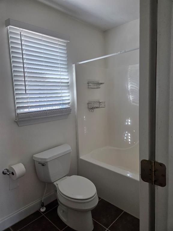 465 Young James Circle Stockbridge, GA 30281 - Photo 23 of 45 a bathroom with a toilet and a shower