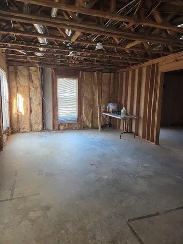 a view of room with furniture