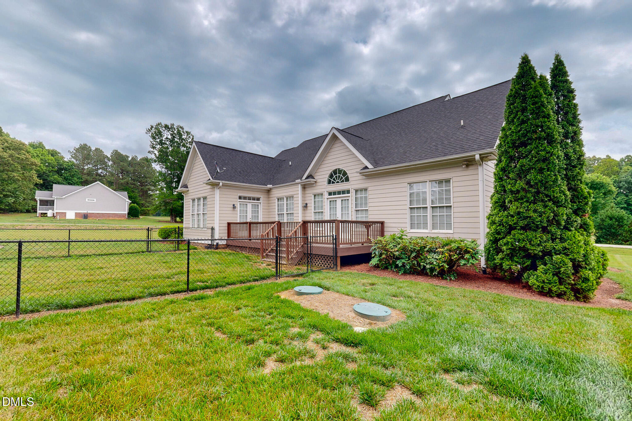 115 Duncan Plantation Road Timberlake, NC 27583 - Photo 5 of 48 a house view with a garden space