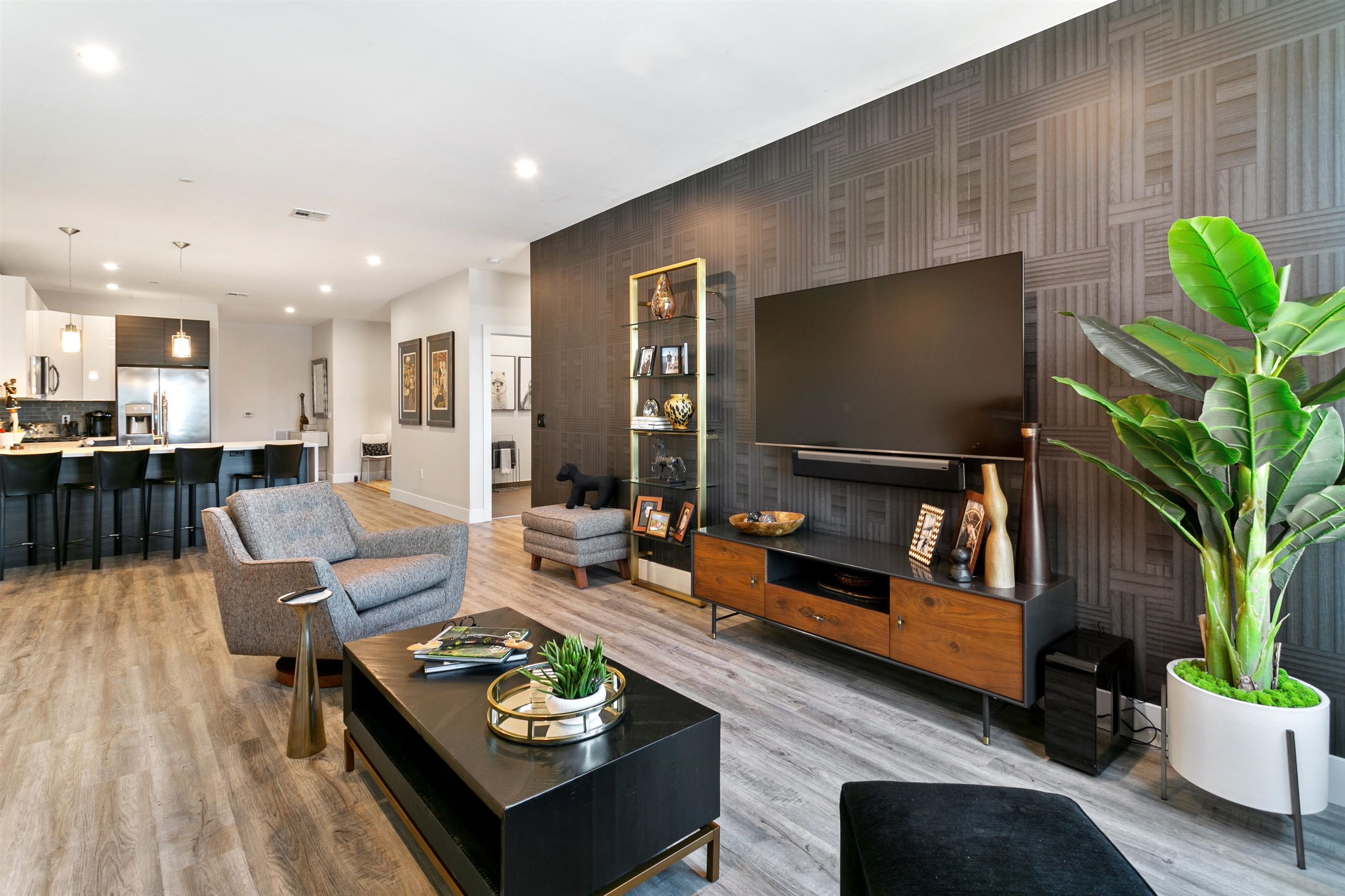 6701 John F. Kennedy Boulevard, Unit 215 North Bergen, NJ 07047 - Photo 4 of 14 a living room with furniture and a flat screen tv