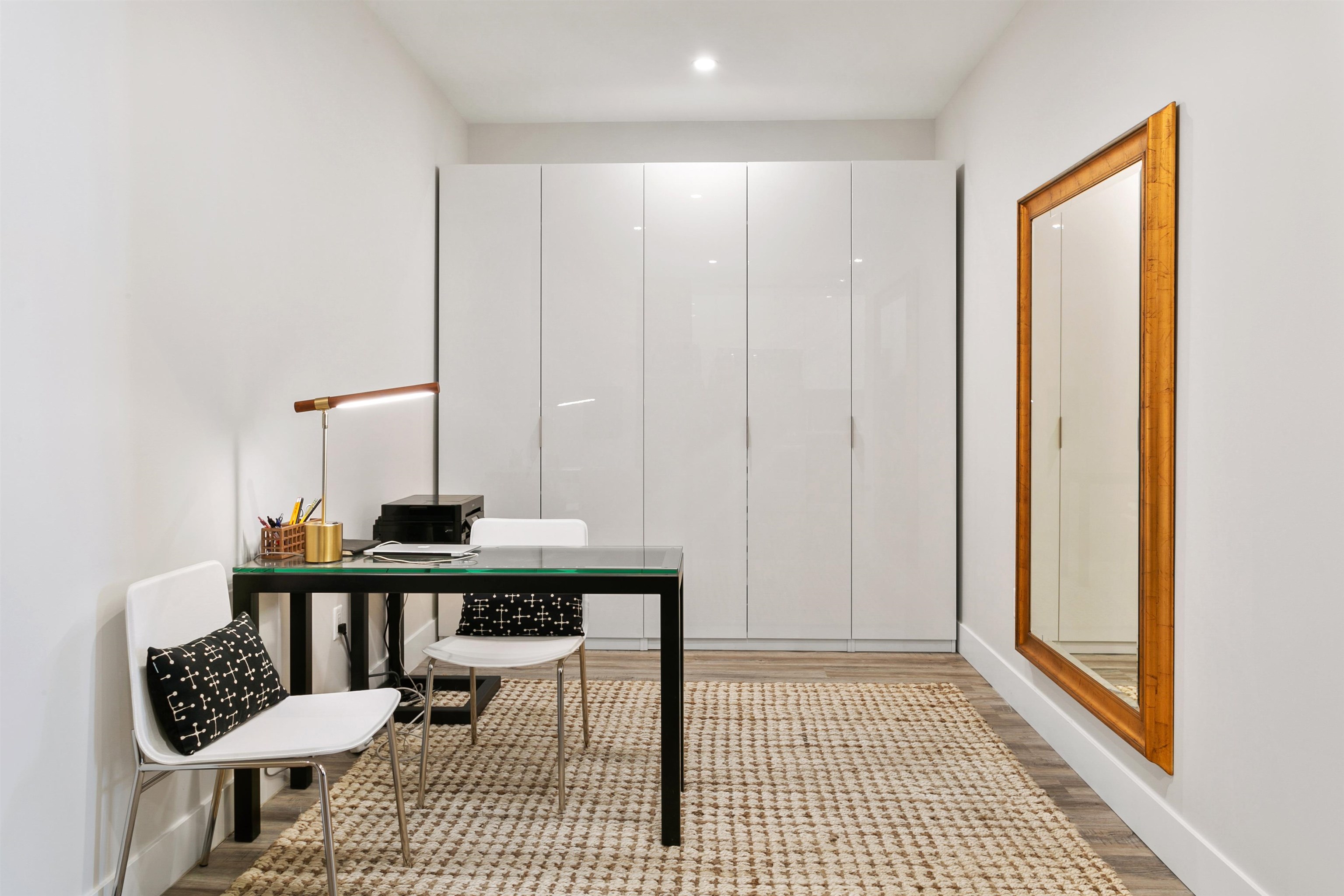 6701 John F. Kennedy Boulevard, Unit 215 North Bergen, NJ 07047 - Photo 6 of 14 a view of a bedroom with furniture and wooden floor