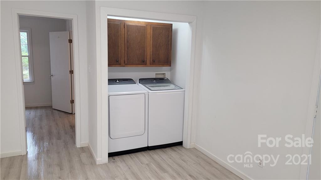 950 Hopps Road, Unit 10 Chester, SC 29706 - Photo 25 of 30 a utility room with dryer and washer