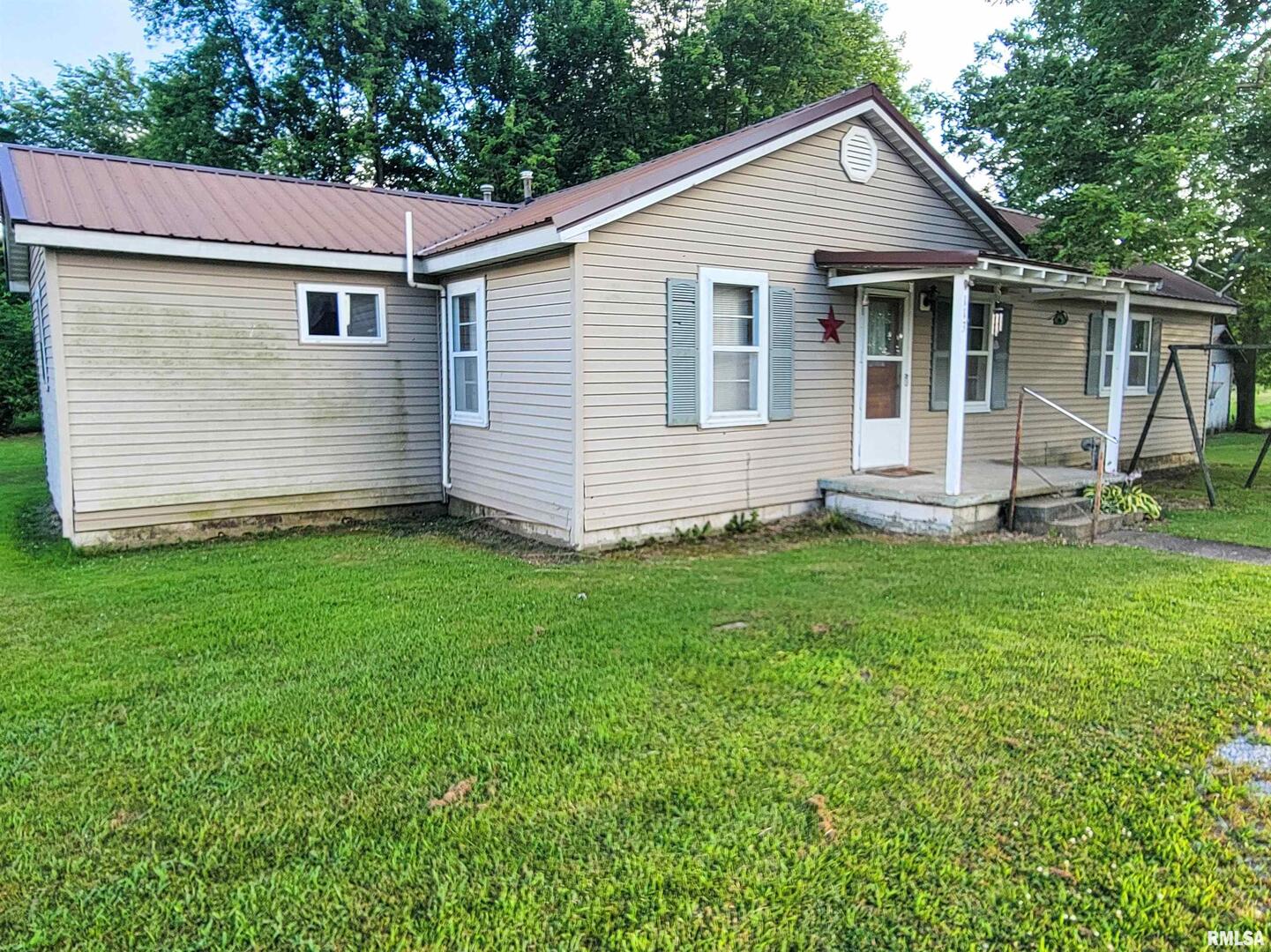 113 Mead Street Southwest Clay City, IL 62824 - Photo 11 of 61 a view of a backyard with a garden