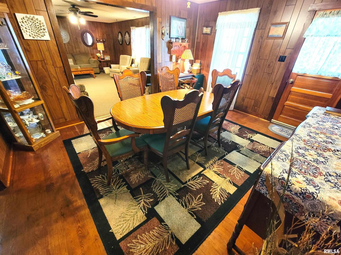 113 Mead Street Southwest Clay City, IL 62824 - Photo 18 of 61 a view of a dining room with furniture and a rug