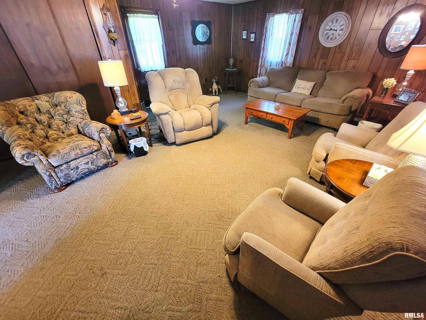 113 Mead Street Southwest Clay City, IL 62824 - Photo 19 of 61 a living room with furniture and a mirror