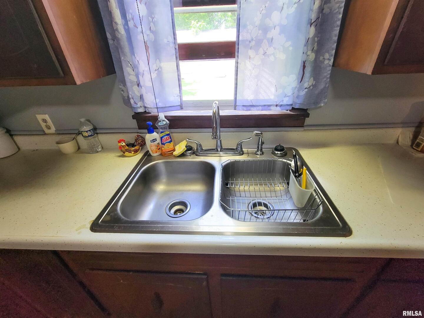 113 Mead Street Southwest Clay City, IL 62824 - Photo 25 of 61 a utility room with a sink and a window