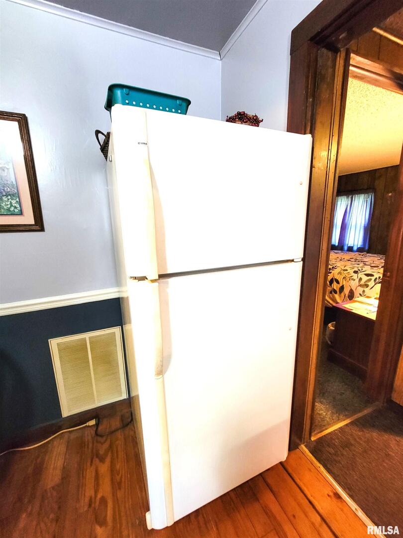 113 Mead Street Southwest Clay City, IL 62824 - Photo 28 of 61 a utility room with mirror and door