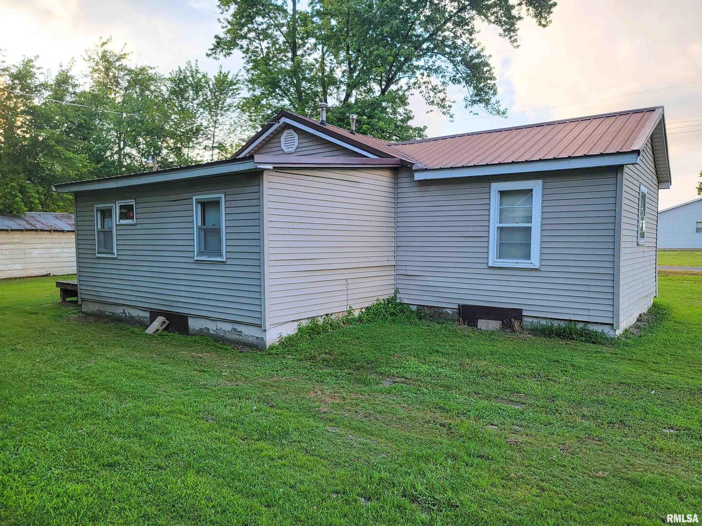 113 Mead Street Southwest Clay City, IL 62824 - Photo 59 of 61 a view of a backyard of the house