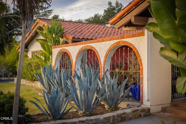 a view of walk in closet with clothes