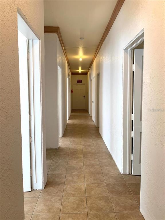 100 John Street Frostproof, FL 33843 - Photo 5 of 15 a view of a hallway