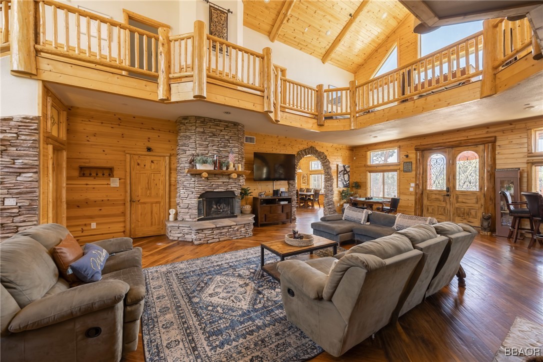 42577 Bear Loop Big Bear City, CA 92314 - Photo 15 of 38 a living room with fireplace furniture and a rug