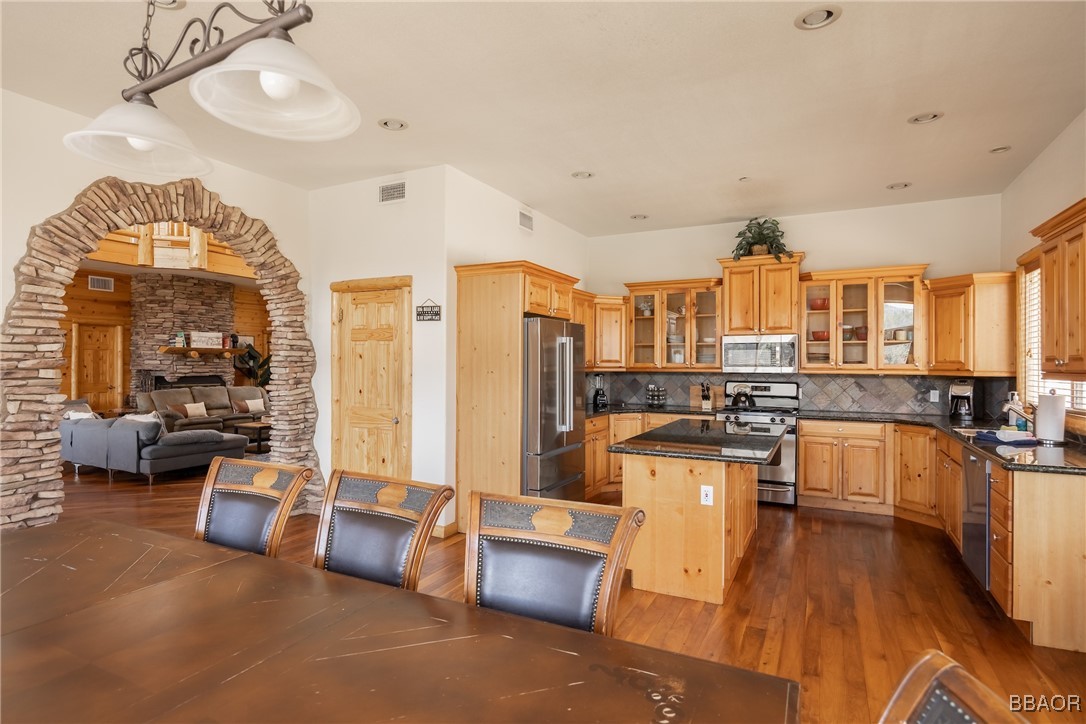 42577 Bear Loop Big Bear City, CA 92314 - Photo 21 of 38 a living room with furniture and a kitchen view